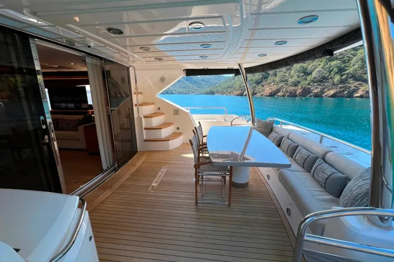  Yacht Photos Pics Luxurious Sunseeker 80 Yacht 2011 with spacious deck, elegant seating, and scenic ocean view.