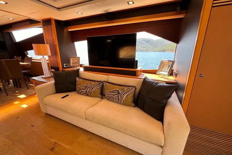  Yacht Photos Pics Luxurious interior of 2011 Sunseeker 80 Yacht with elegant sofa and scenic window view.