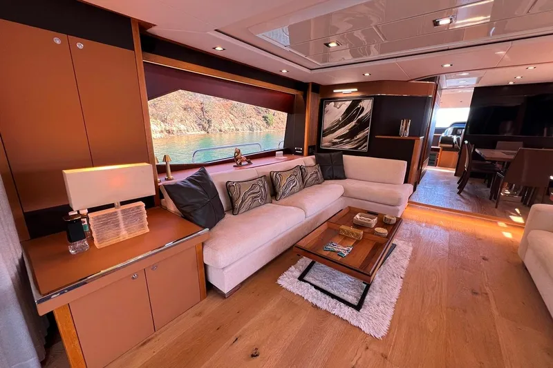  Yacht Photos Pics Luxurious interior of a 2011 Sunseeker 80 Yacht with elegant furnishings and scenic window view.