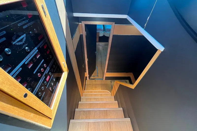  Yacht Photos Pics Staircase inside 2011 Sunseeker 80 Yacht with control panel on the side.