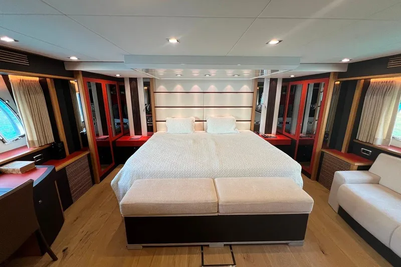  Yacht Photos Pics Luxurious bedroom interior of a 2011 Sunseeker 80 Yacht with modern design elements.