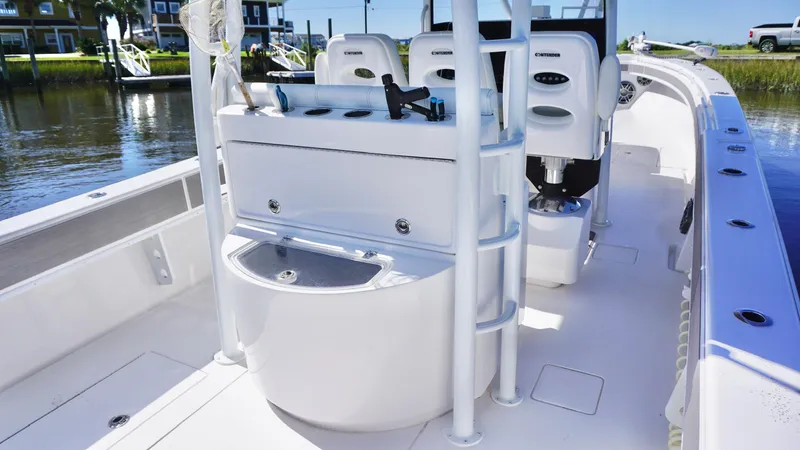  Yacht Photos Pics 2024 Contender 39ST boat interior with seating and fishing equipment.