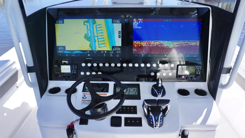  Yacht Photos Pics 2024 Contender 39ST boat dashboard with advanced navigation and control systems.