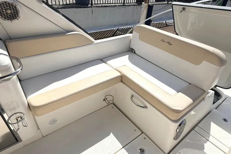 Sweet Melissa Yacht Photos Pics 2013 Sea Ray 370 Venture boat seating area with beige and white upholstery.