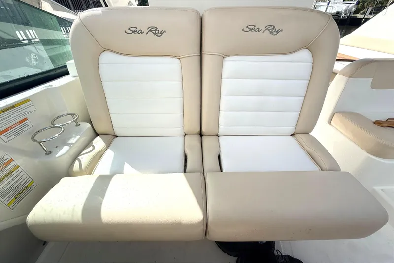 Sweet Melissa Yacht Photos Pics 2013 Sea Ray 370 Venture boat seats, beige and white upholstery, with cup holders.