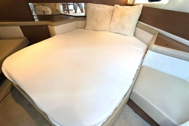 Sweet Melissa Yacht Photos Pics Cozy cabin interior of 2013 Sea Ray 370 Venture with plush bedding.