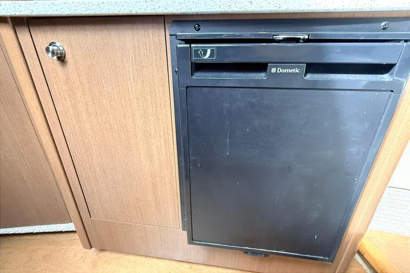 Sweet Melissa Yacht Photos Pics Dometic fridge in 2013 Sea Ray 370 Venture boat kitchen interior.