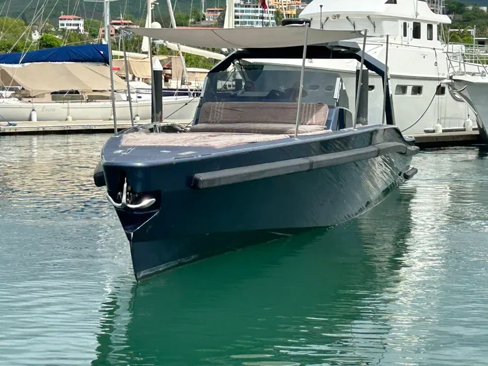 Quoq Yacht Photos Pics Luxury Maori 50 yacht docked in marina, 2016 model, sleek design, calm waters.