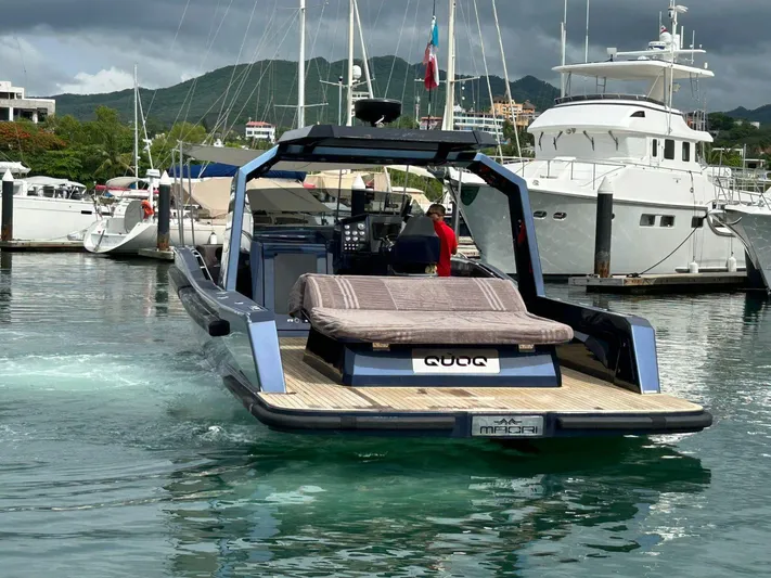 Quoq Yacht Photos Pics Luxury Maori 50 yacht from 2016 docked in a marina, surrounded by other boats.