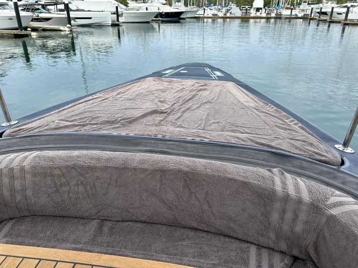 Quoq Yacht Photos Pics Bow of a 2016 Maori 50 yacht docked at a marina.