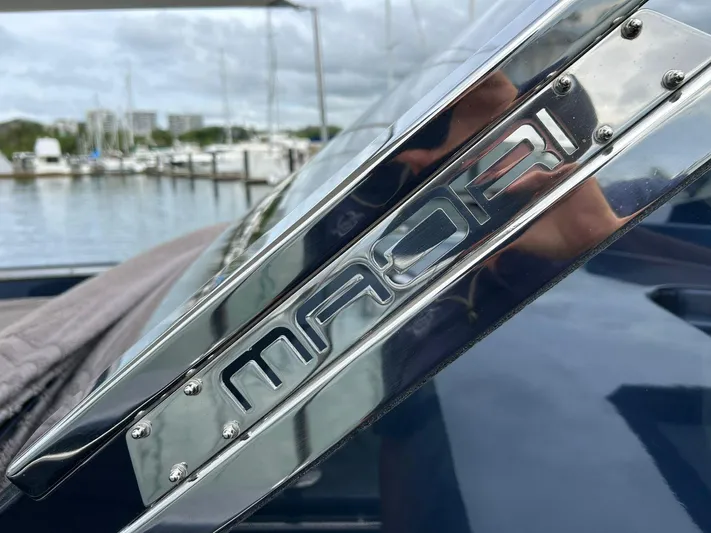 Quoq Yacht Photos Pics Close-up of a 2016 Maori 50 yacht detail with marina background.