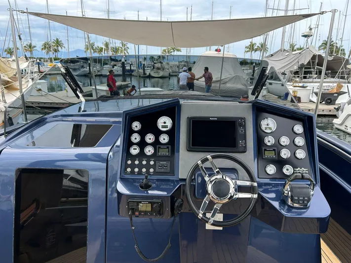 Quoq Yacht Photos Pics Control panel of a 2016 Maori 50 yacht docked at a marina.