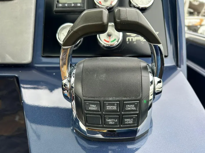 Quoq Yacht Photos Pics Boat throttle control panel of a 2016 Maori 50 yacht with various function buttons.