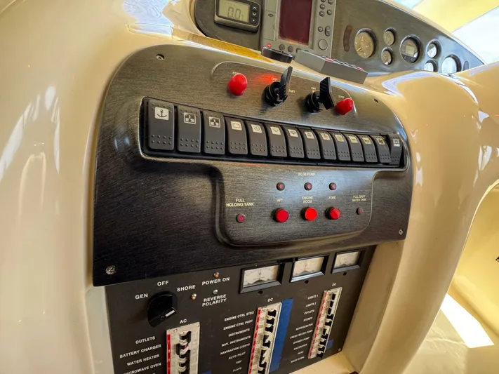 Weekender 3 Yacht Photos Pics Control panel of a 2005 Azimut 42 Fly yacht with switches and gauges.
