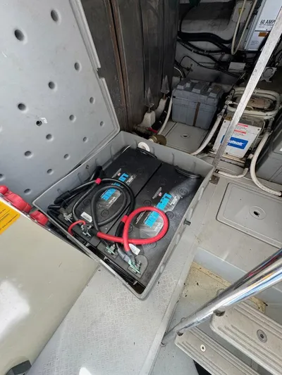 Weekender 3 Yacht Photos Pics Battery compartment of a 2005 Azimut 42 Fly yacht, showing wiring and connections.