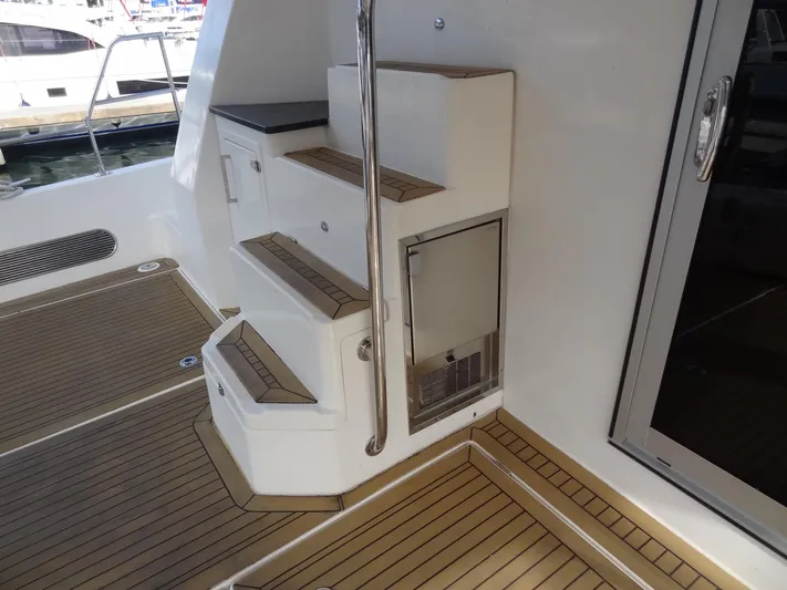 Dalliance Yacht Photos Pics Staircase and deck area on a 2014 Leopard 58 yacht.