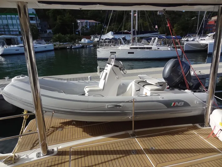 Dalliance Yacht Photos Pics Inflatable boat on Leopard 58 yacht, docked at marina, 2014 model.
