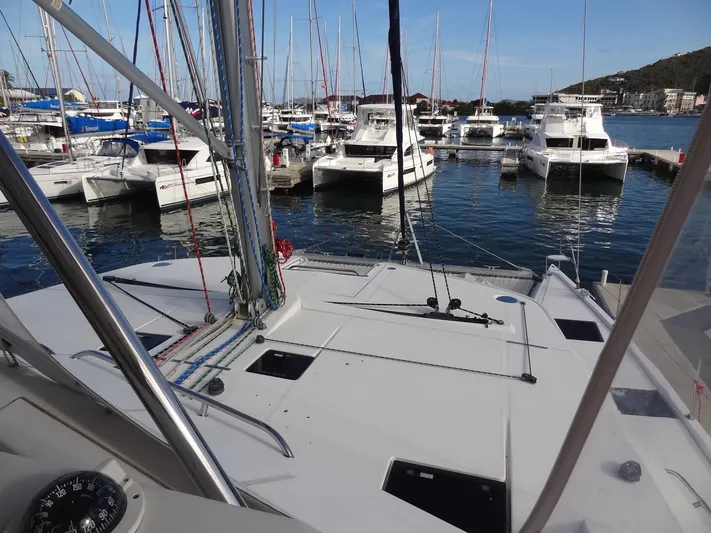Dalliance Yacht Photos Pics View from Leopard 58 catamaran, 2014 model, docked at a marina with other boats.
