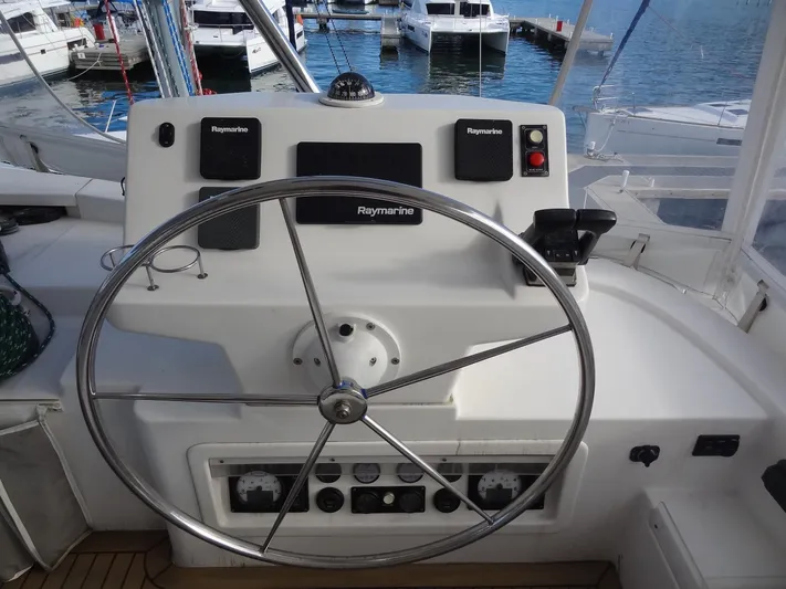 Dalliance Yacht Photos Pics Helm station of a 2014 Leopard 58 catamaran with Raymarine electronics.
