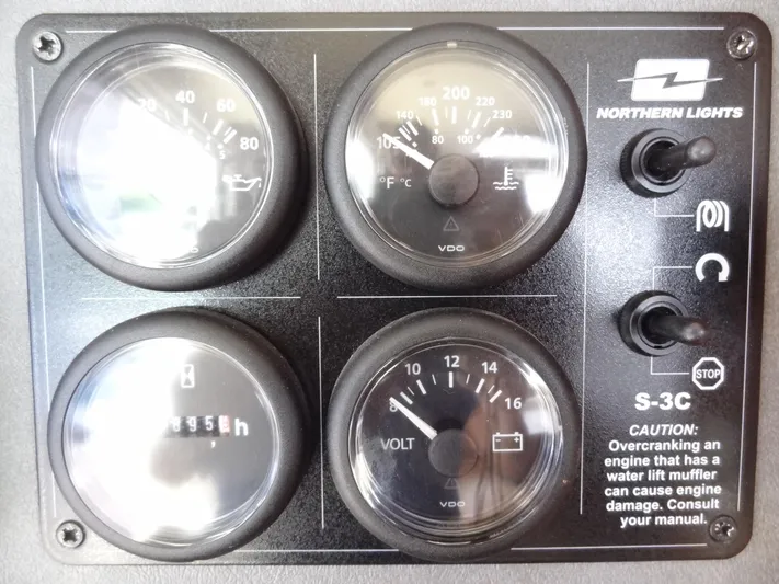Dalliance Yacht Photos Pics 2014 Leopard 58 engine control panel with gauges and switches.
