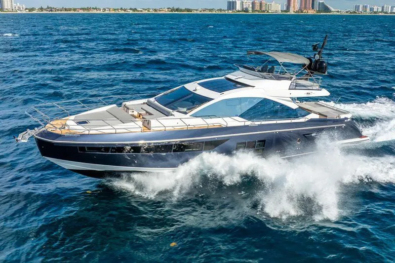  Yacht Photos Pics 2019 Azimut S7 yacht cruising on open blue ocean waters.