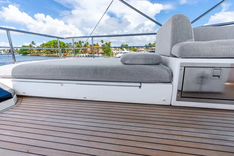  Yacht Photos Pics Luxurious deck seating on 2019 Azimut S7 yacht with scenic waterfront view.