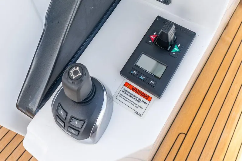 Yacht Photos Pics Control panel of a 2019 Azimut S7 yacht with joystick and digital display.
