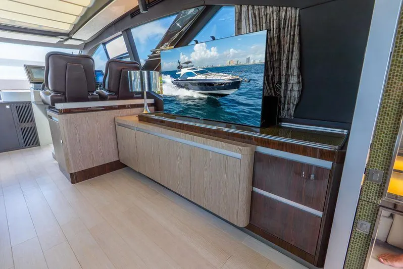  Yacht Photos Pics Luxurious interior of 2019 Azimut S7 yacht with modern entertainment setup.