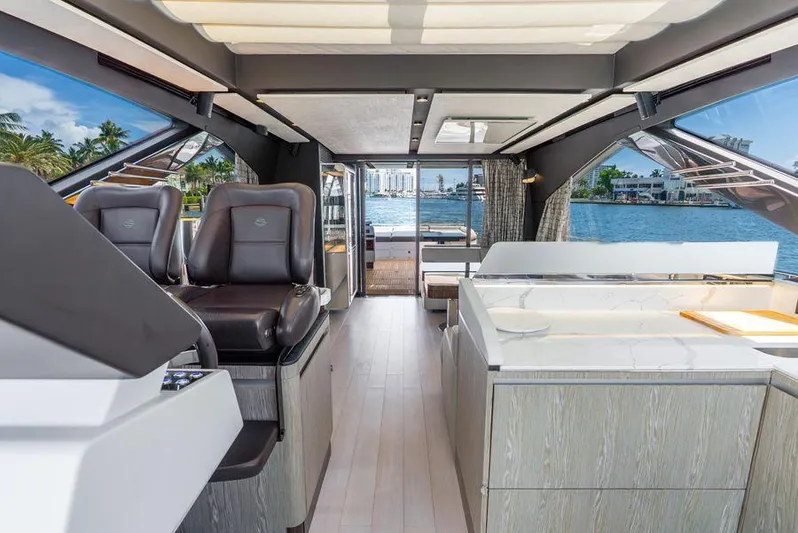  Yacht Photos Pics Luxurious interior of 2019 Azimut S7 yacht with modern seating and panoramic windows.