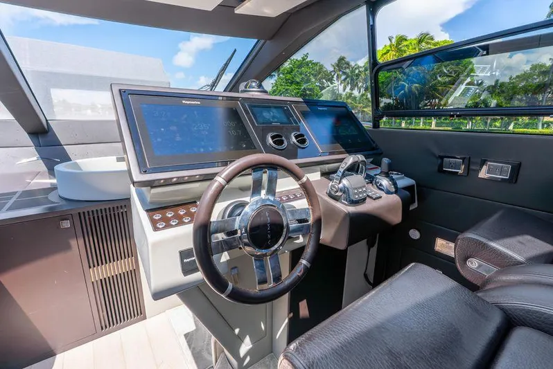 Yacht Photos Pics 2019 Azimut S7 yacht helm with modern controls and dual displays.
