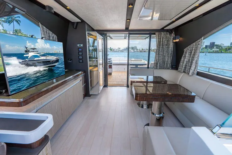  Yacht Photos Pics Luxurious interior of 2019 Azimut S7 yacht with modern furnishings and waterfront view.