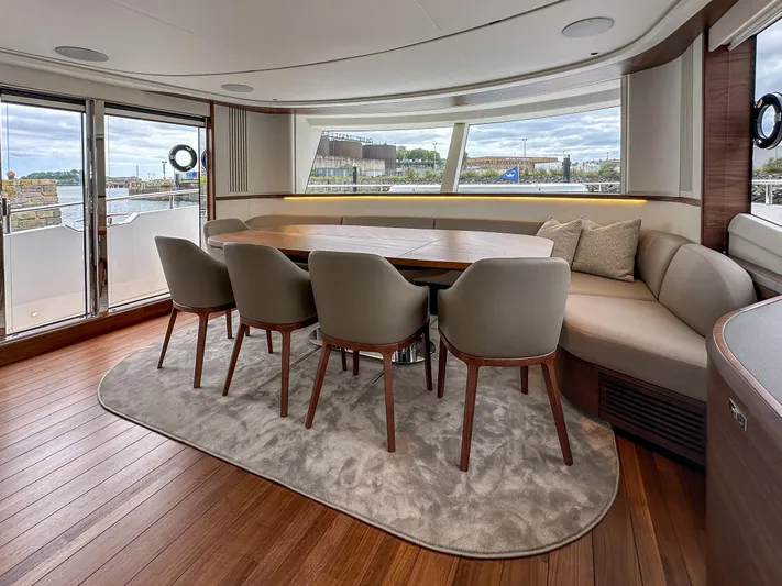 X80034 Yacht Photos Pics Luxurious dining area on 2024 Princess X80 yacht with elegant seating and panoramic views.