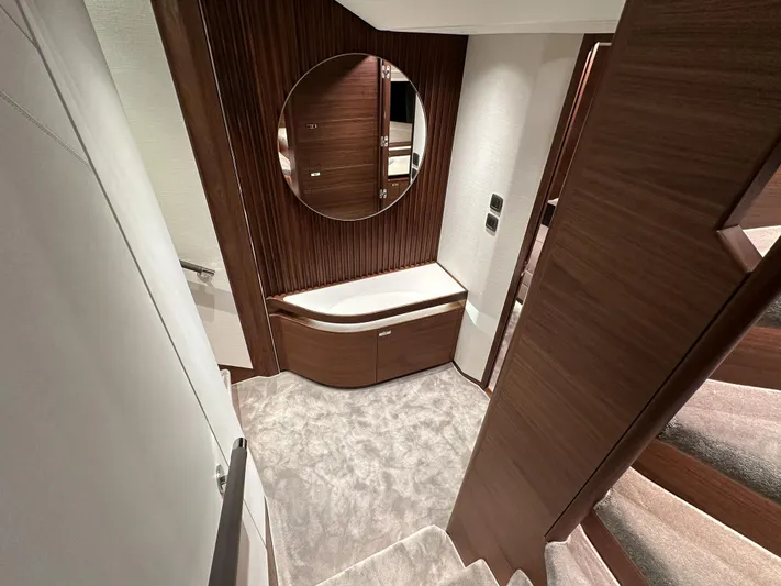 X80034 Yacht Photos Pics Luxurious interior of 2024 Princess X80 yacht with elegant wood paneling and modern design.