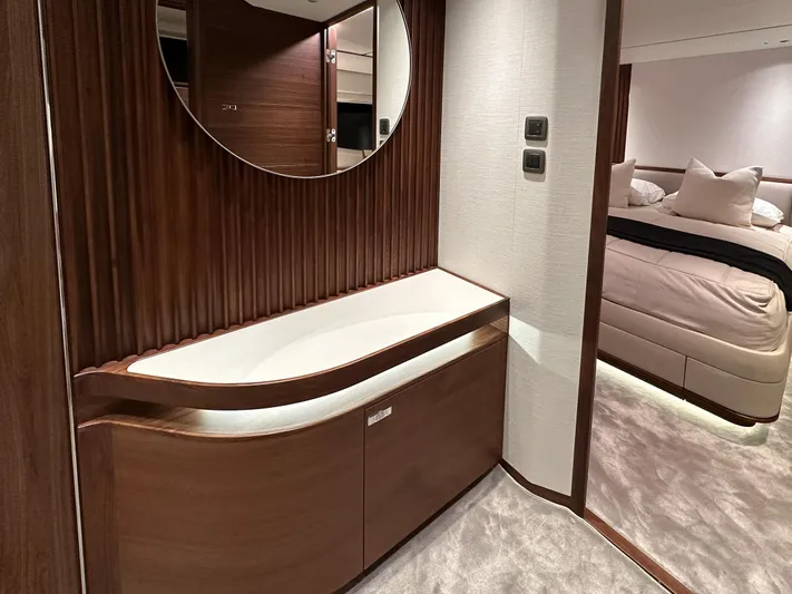X80034 Yacht Photos Pics Luxurious interior of 2024 Princess X80 yacht with elegant wood finishes and modern design.