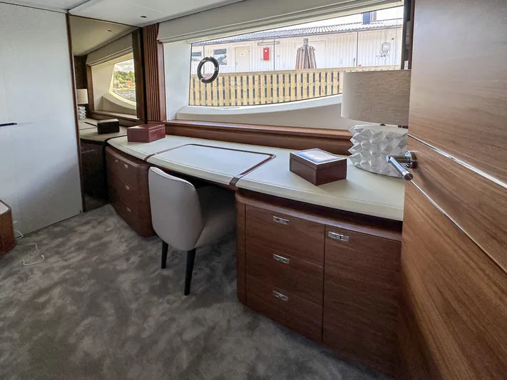 X80034 Yacht Photos Pics Luxurious interior of 2024 Princess X80 yacht with elegant desk and seating area.