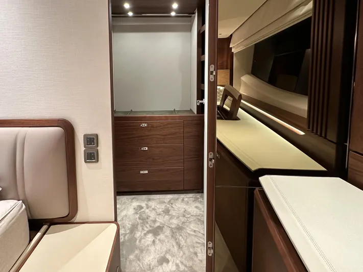 X80034 Yacht Photos Pics Luxurious interior of 2024 Princess X80 yacht with elegant wood finishes and modern design.
