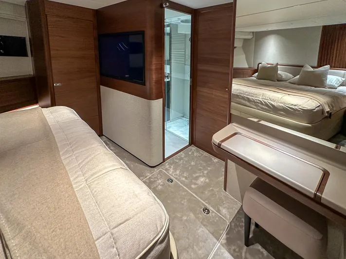 X80034 Yacht Photos Pics Luxurious interior of 2024 Princess X80 yacht featuring elegant wood finishes and plush furnishings.