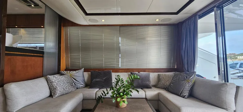  Yacht Photos Pics Luxurious interior of a 2014 Princess 64 yacht with elegant seating and decor.