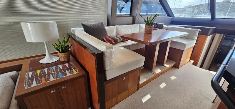  Yacht Photos Pics Luxurious interior of a 2014 Princess 64 yacht with elegant seating and decor.