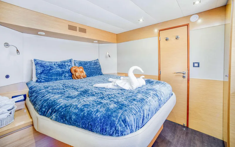 Endless Azul Yacht Photos Pics Luxurious bedroom in 2013 Fountaine Pajot Sanya 57 yacht with plush blue bedding.