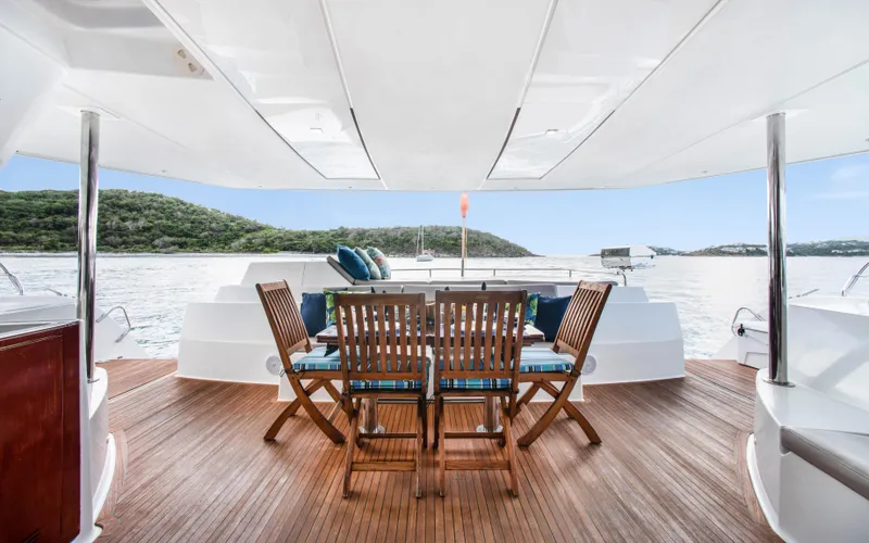 Endless Azul Yacht Photos Pics Luxurious 2013 Fountaine Pajot Sanya 57 yacht with elegant outdoor dining area.