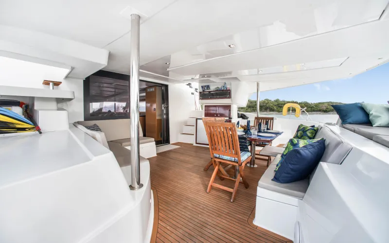 Endless Azul Yacht Photos Pics Spacious deck of 2013 Fountaine Pajot Sanya 57 yacht with seating and dining area.