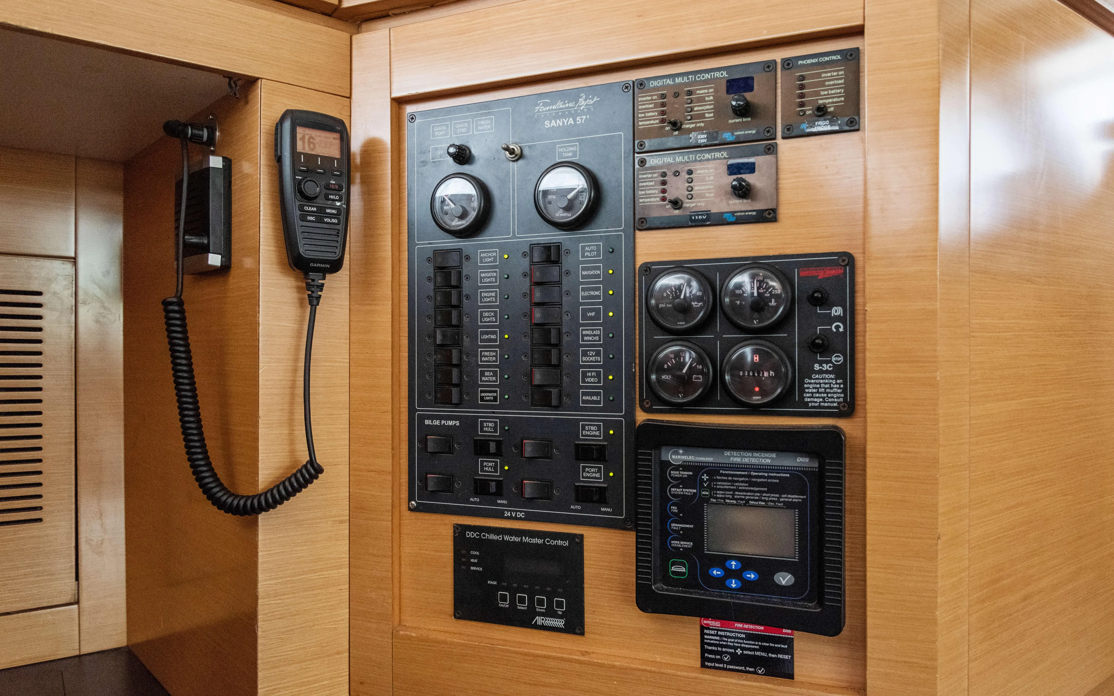 Endless Azul Yacht Photos Pics Control panel of 2013 Fountaine Pajot Sanya 57 yacht with communication device and gauges.