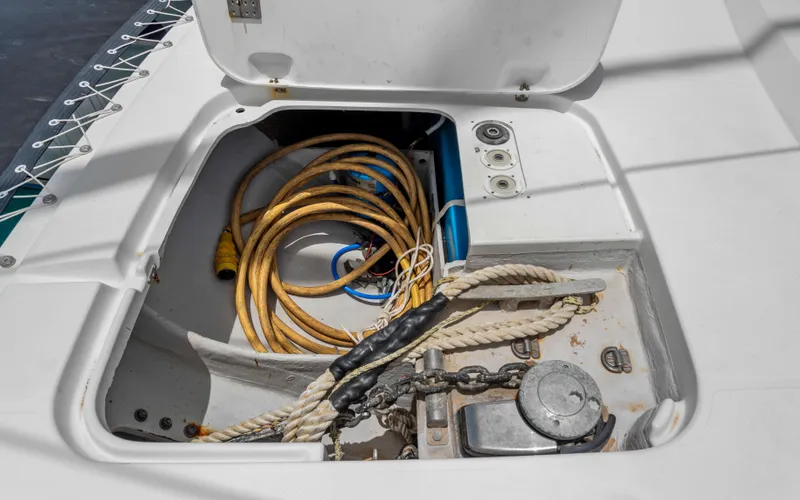Endless Azul Yacht Photos Pics Open storage compartment on 2013 Fountaine Pajot Sanya 57 yacht with ropes and cables.