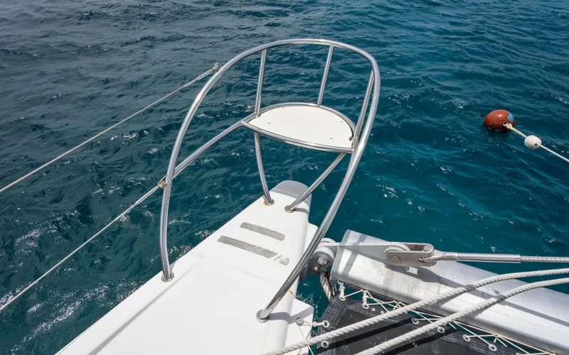 Endless Azul Yacht Photos Pics Bow of 2013 Fountaine Pajot Sanya 57 catamaran on blue ocean water.