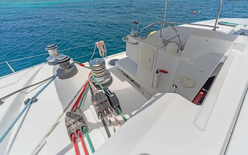 Endless Azul Yacht Photos Pics Helm and deck of 2013 Fountaine Pajot Sanya 57 catamaran with winches and ropes.