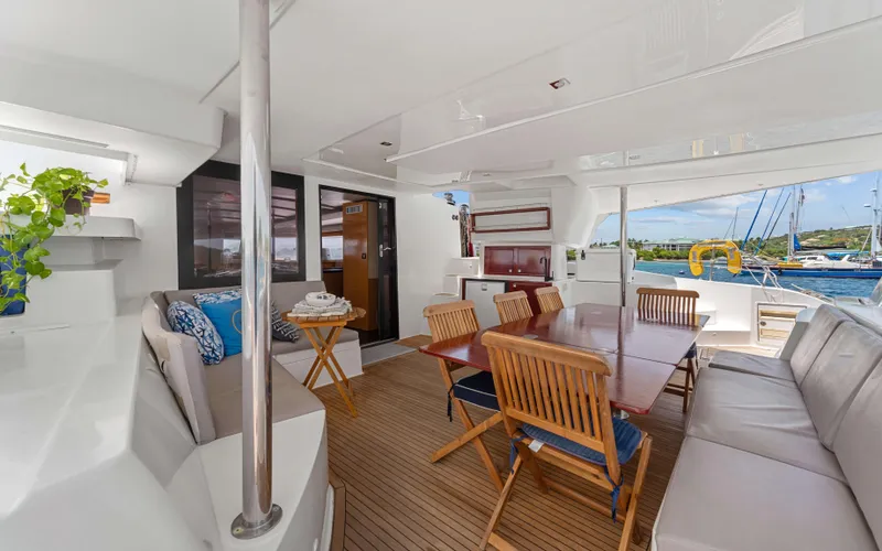 Endless Azul Yacht Photos Pics Luxurious 2013 Fountaine Pajot Sanya 57 yacht interior with dining area and comfortable seating.