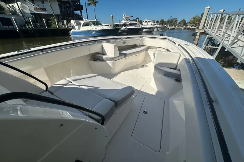  Yacht Photos Pics 2022 Fountain 38 CC LS boat interior with spacious seating and sleek design.
