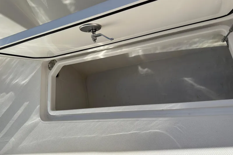  Yacht Photos Pics Open storage compartment on 2022 Fountain 38 CC LS boat.