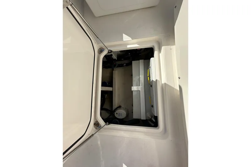  Yacht Photos Pics 2022 Fountain 38 CC LS boat storage compartment interior view.